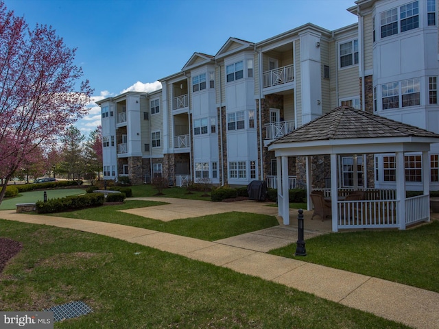 view of home's community featuring a yard and a gazebo