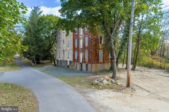 view of home's exterior featuring aphalt driveway