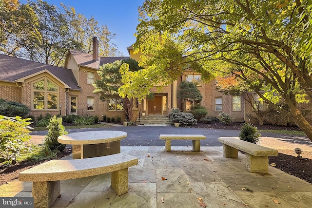 view of community with a patio area