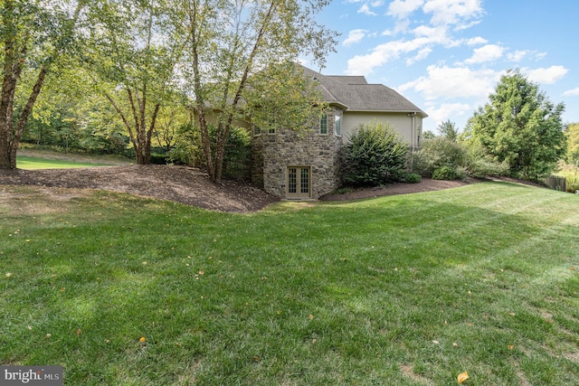 view of yard with french doors