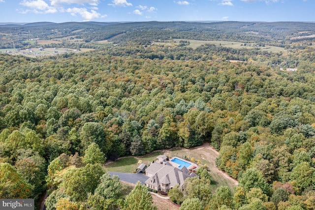 aerial view with a wooded view