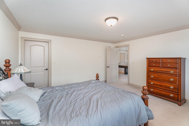 bedroom with baseboards, carpet floors, and crown molding