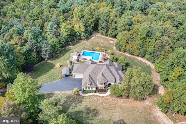 aerial view featuring a forest view