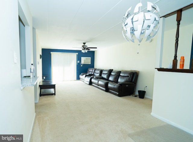 living room with a wall mounted air conditioner, light colored carpet, and ceiling fan