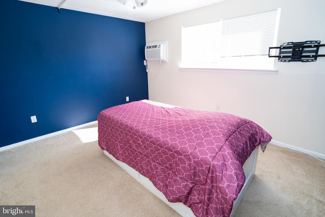 carpeted bedroom with a wall mounted AC