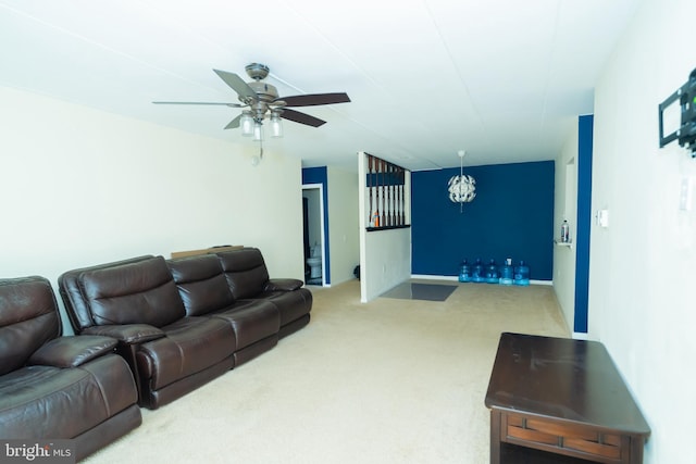 carpeted living room featuring ceiling fan