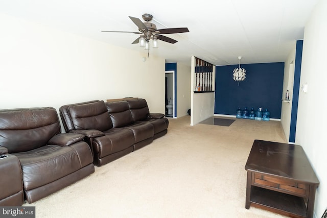 carpeted living room featuring ceiling fan