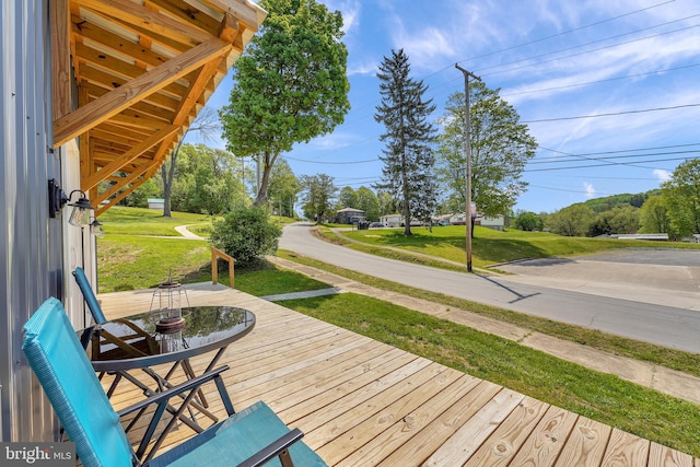 deck featuring a yard