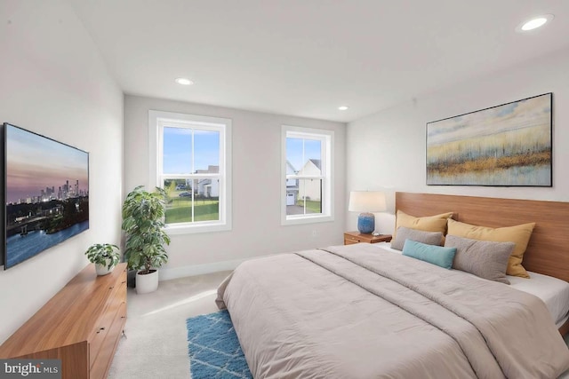 bedroom with light carpet