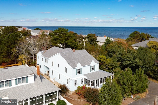 aerial view featuring a water view