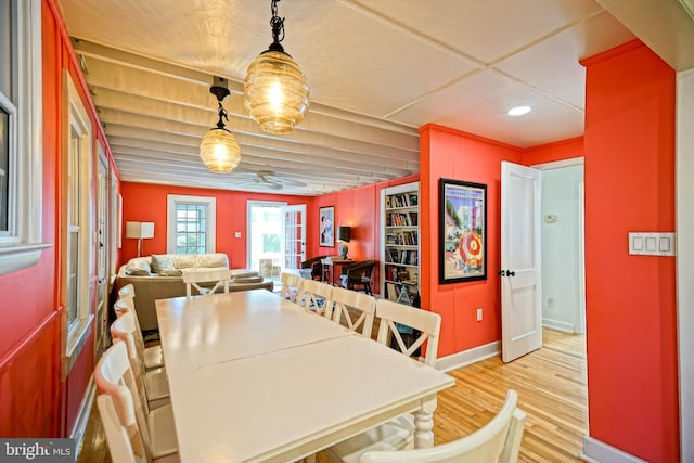 dining space featuring light wood-type flooring