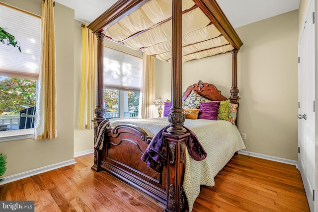 bedroom featuring wood-type flooring