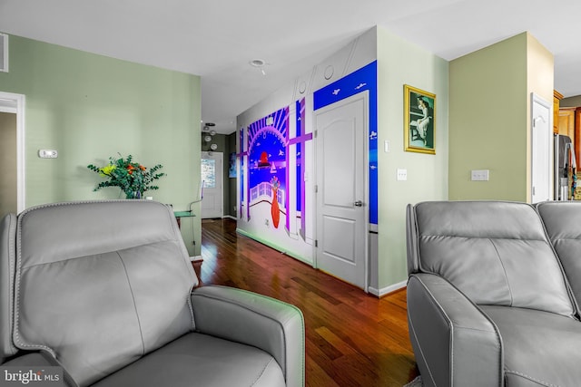 living room featuring dark wood-type flooring