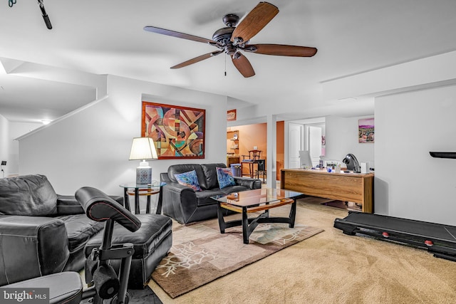 living room with carpet floors and ceiling fan