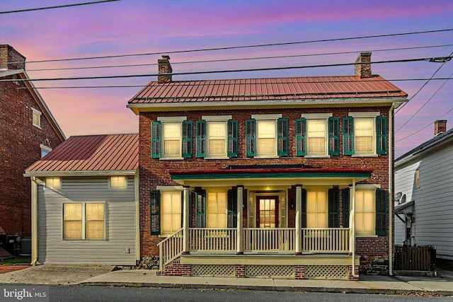 view of front of home featuring covered porch