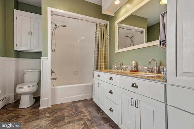 full bathroom featuring vanity, toilet, and shower / bath combination with curtain