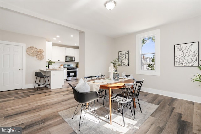 dining room featuring light wood-type flooring