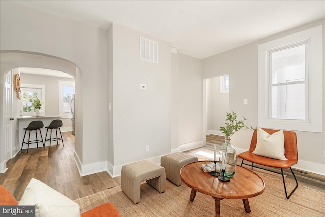 sitting room with light hardwood / wood-style floors