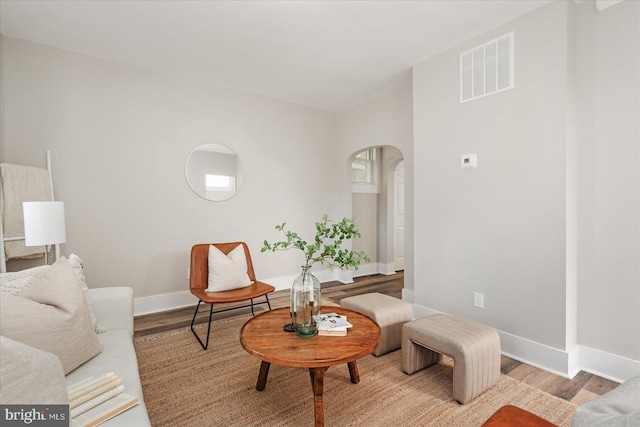 living room with light hardwood / wood-style floors