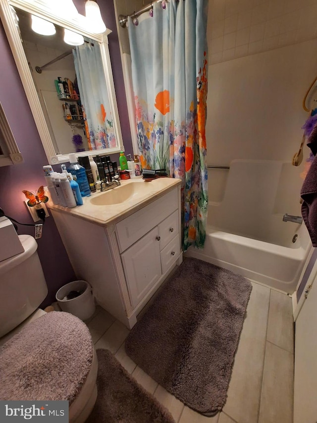 full bathroom with vanity, toilet, tile patterned floors, and shower / bath combination with curtain