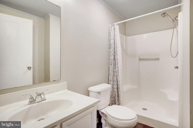 bathroom featuring a shower with curtain, vanity, toilet, and crown molding