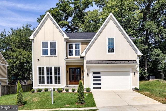 view of front facade featuring a garage and a front yard