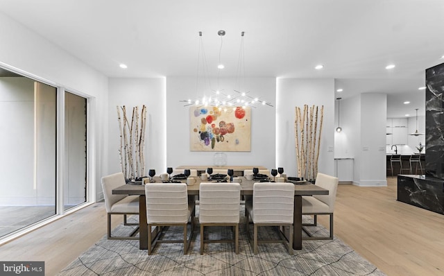5630 8th St N, Arlington, VA 22205 - dining space featuring light wood finished floors, recessed lighting, and a chandelier