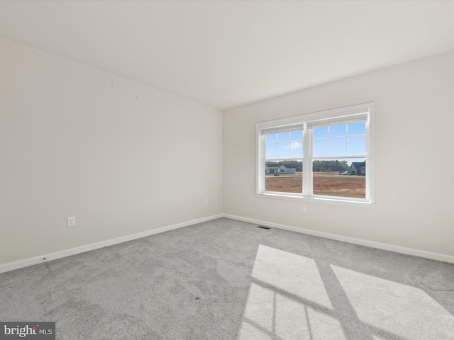 view of carpeted spare room