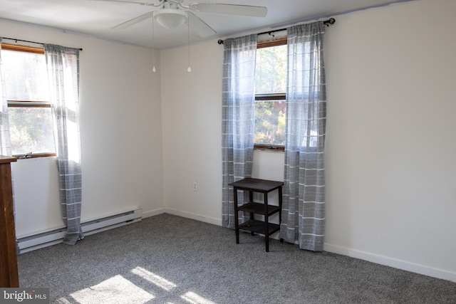 unfurnished room with a baseboard radiator, carpet, and ceiling fan