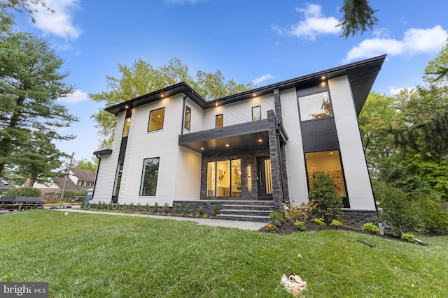 view of front of house with a front lawn