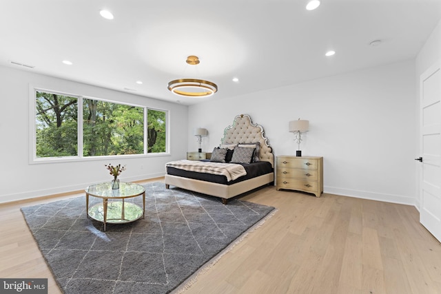 bedroom featuring light wood-type flooring