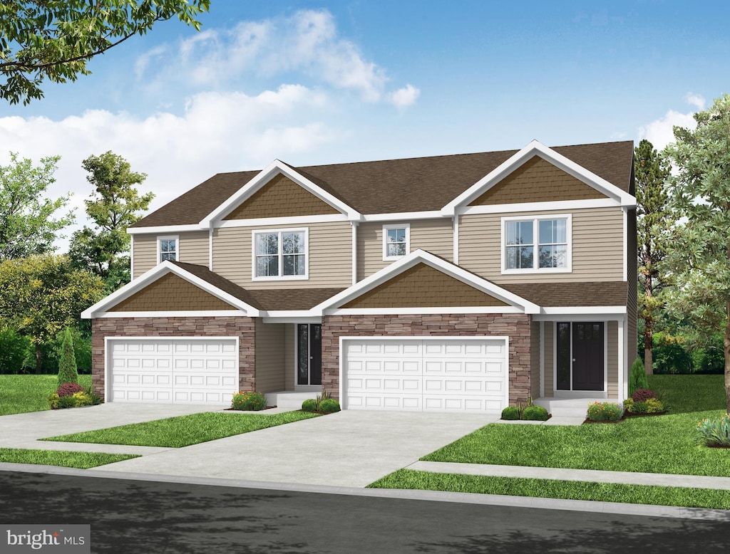 view of front of house featuring roof with shingles, concrete driveway, a front yard, a garage, and stone siding