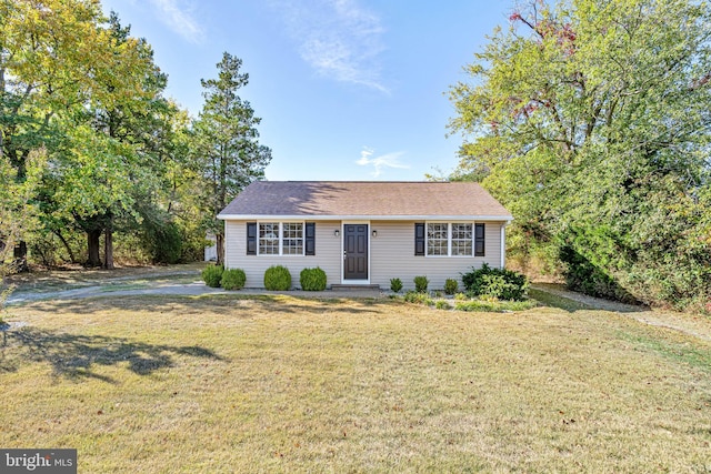 view of front of home with a front lawn