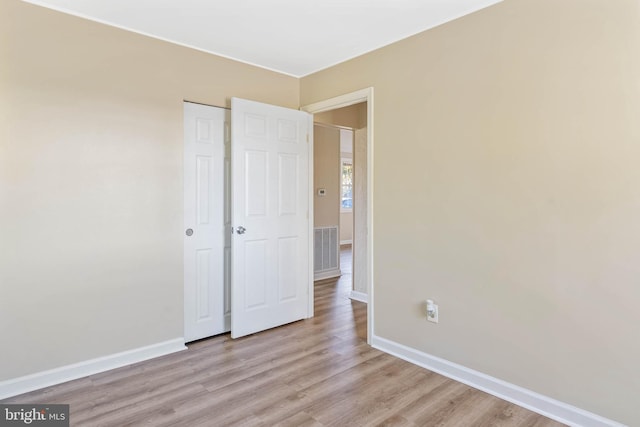 unfurnished bedroom with light hardwood / wood-style floors