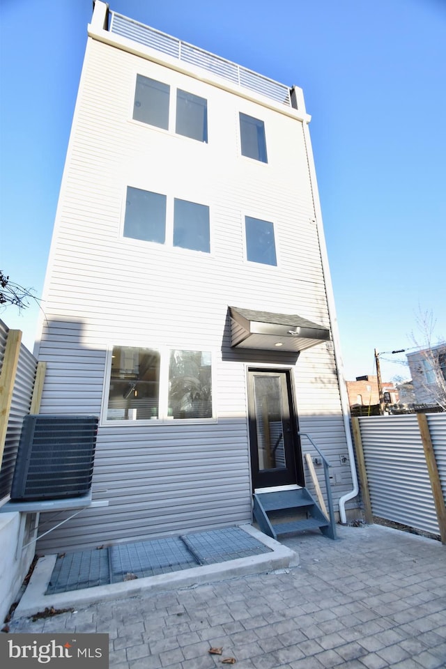 back of house with a patio area