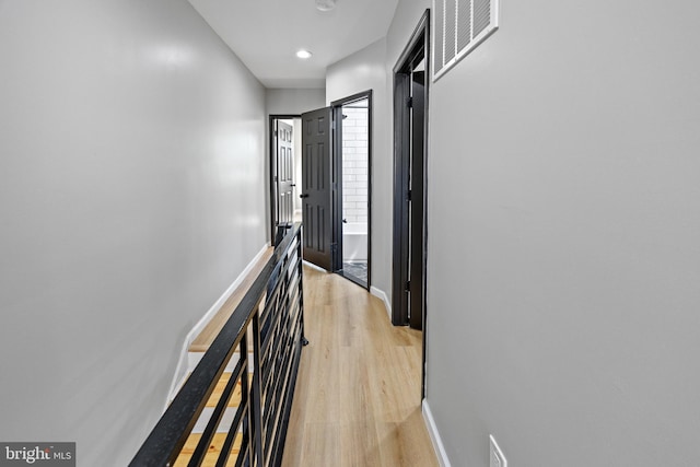 hall featuring light wood-type flooring