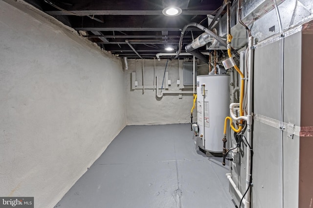 unfinished below grade area featuring water heater
