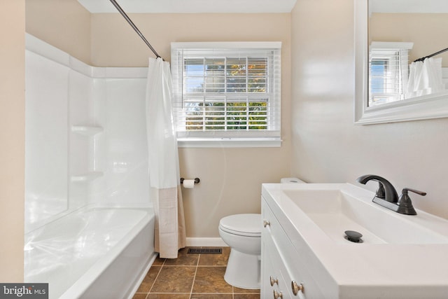 full bathroom with toilet, shower / bath combo, vanity, and tile patterned flooring