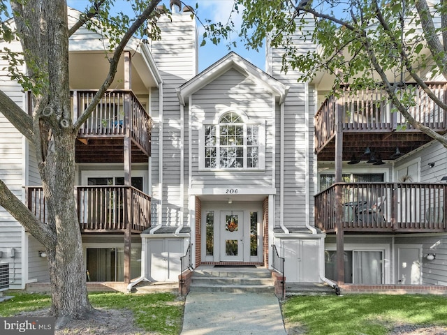 view of front of home with a balcony