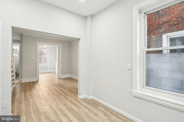 corridor featuring light wood-type flooring