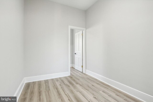 unfurnished room featuring light hardwood / wood-style flooring