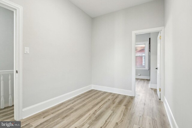 unfurnished room featuring light hardwood / wood-style flooring