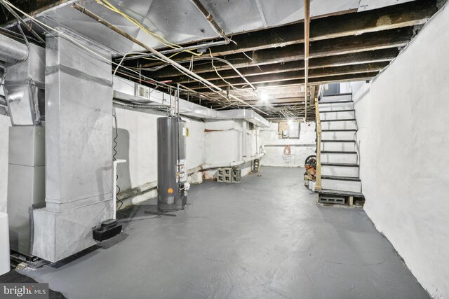 basement with gas water heater and heating unit