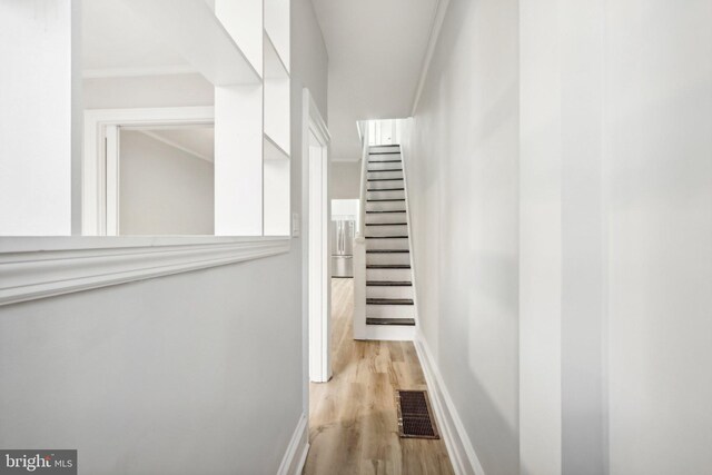 hallway with light wood-type flooring