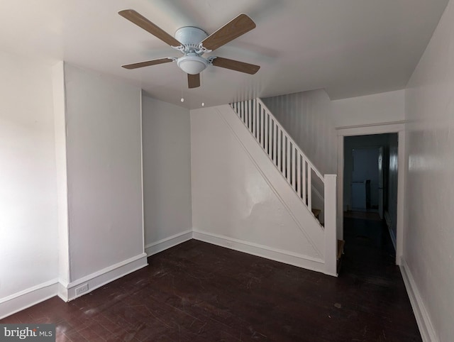 1909 E Wishart St, Philadelphia, PA 19134 - interior space featuring baseboards, a ceiling fan, wood finished floors, and stairway