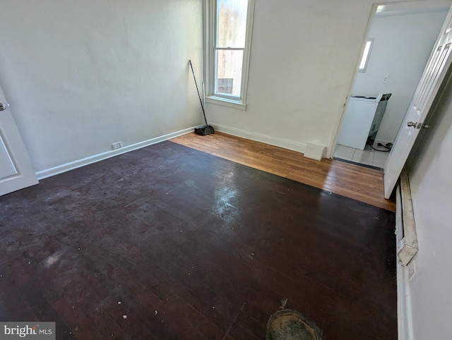 1909 E Wishart St, Philadelphia, PA 19134 - empty room featuring wood finished floors and baseboards