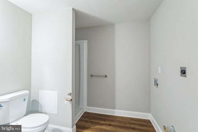 bathroom featuring toilet and hardwood / wood-style flooring