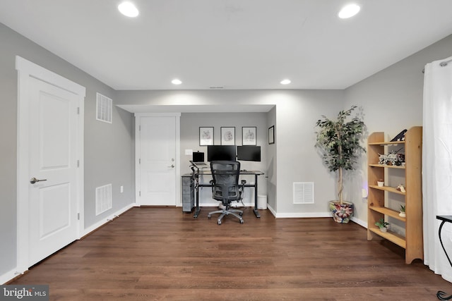 office space with dark hardwood / wood-style floors