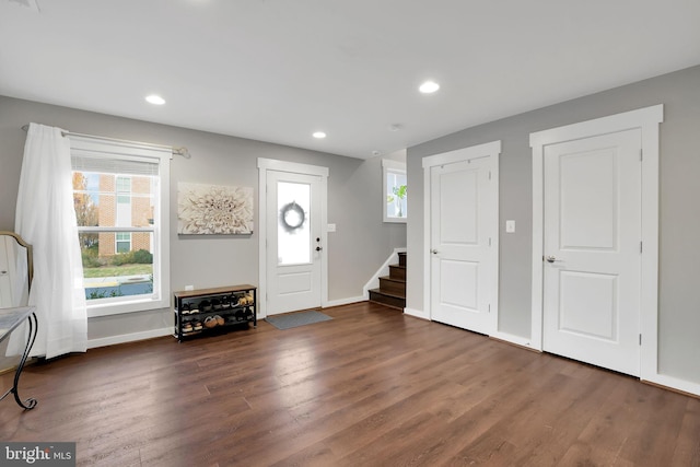 entrance foyer with dark hardwood / wood-style flooring