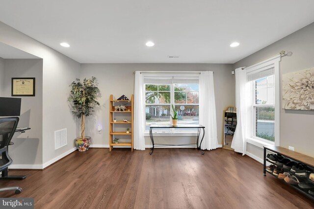 misc room with dark wood-type flooring